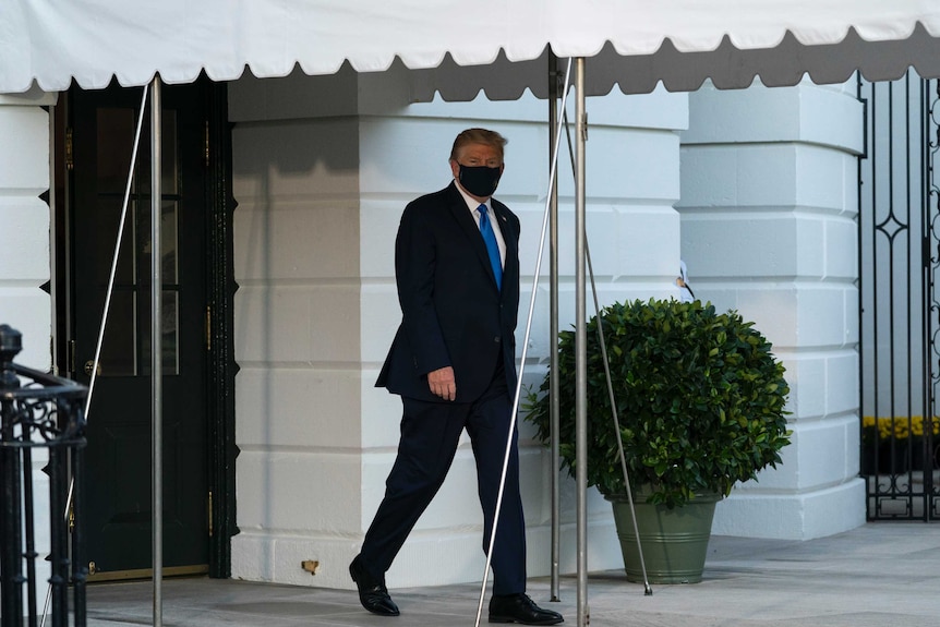 President Donald Trump leaves the White House to board Marine One en route to Walter Reed National Military Medical Center