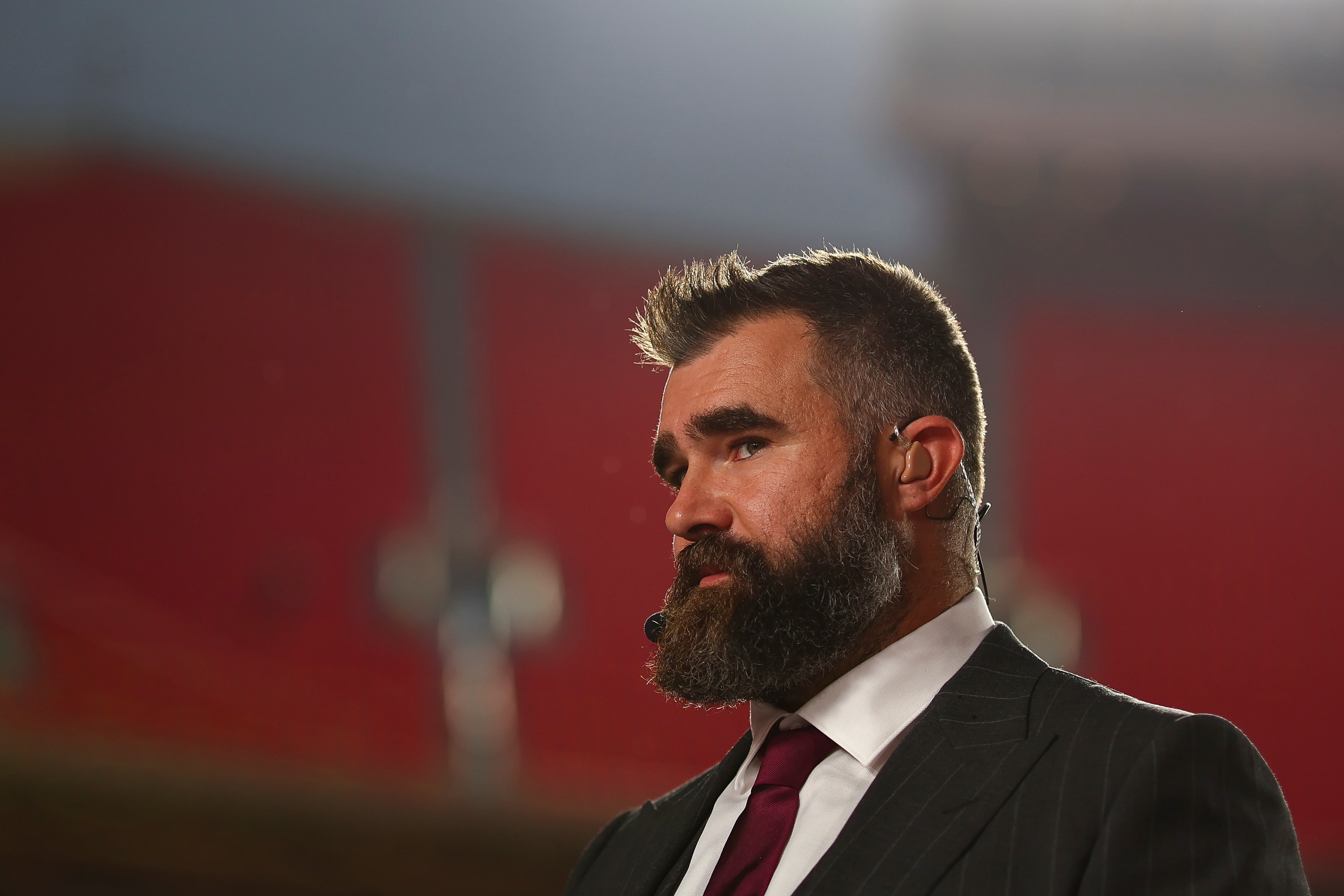 Jason Kelce wears a microphone before broadcasting an NFL game for ESPN.