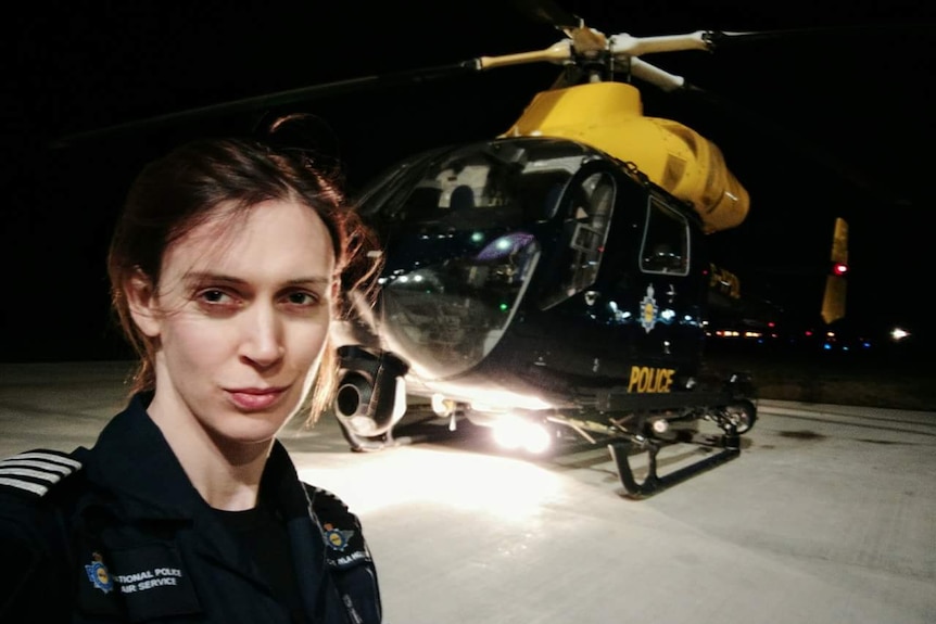 Ayla Holdom in front of her police helicopter