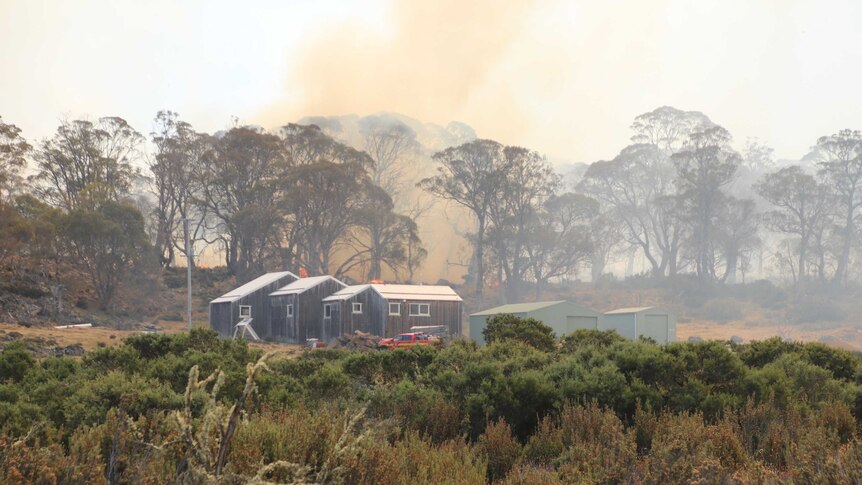 Fire threatening a parks and wildlife workshop at Liawenee.