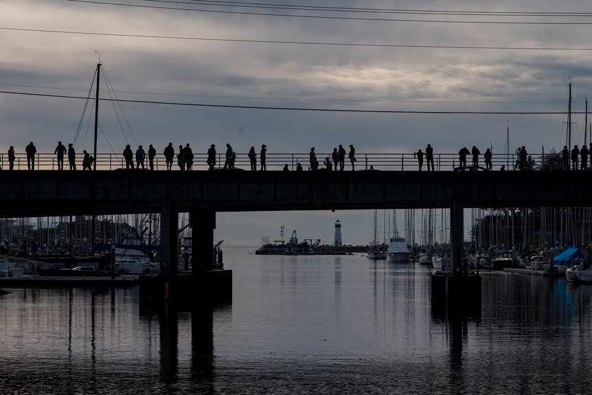 people on a jetty