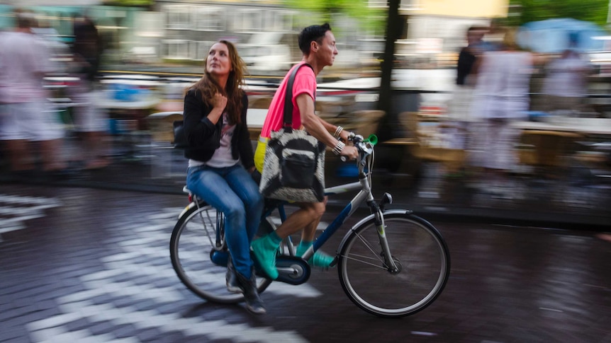 Biking in Amsterdam. Amsterdam, The Netherlands