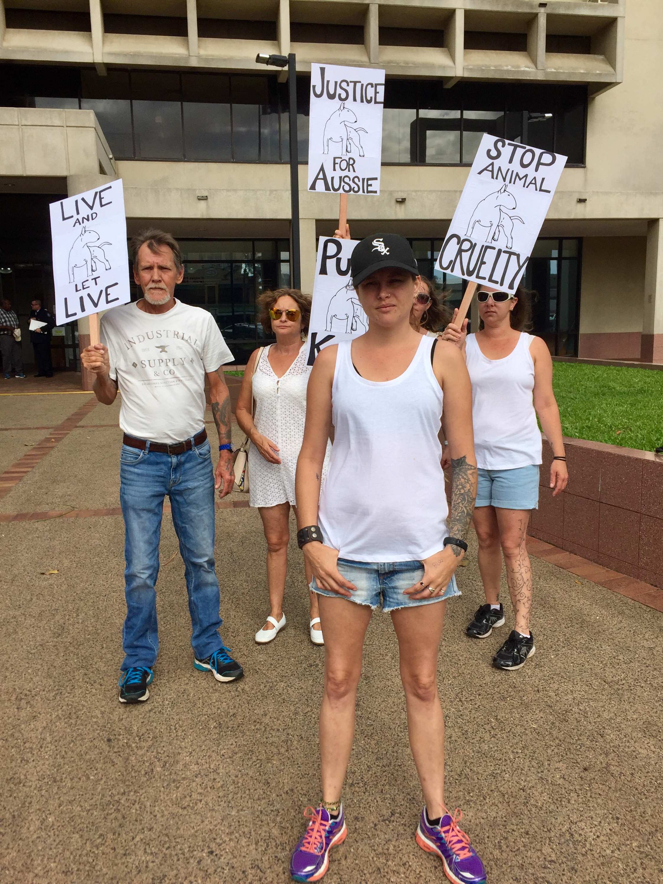 'Justice for Aussie': Cairns family protests fatal stabbing of pet dog ...