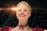 Margot Robbie smiles in a still image from the film I, Tonya