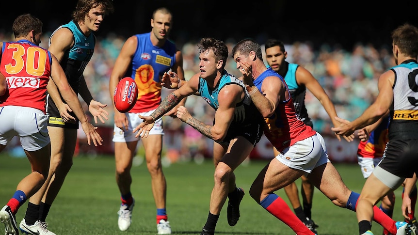 Top and bottom of the ladder teams Port Adelaide and Brisbane doing battle in round 4, 2014.