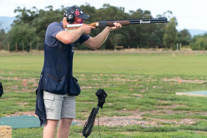 Olympian James Willett shooting a gun at Melbourne Gun Club during the third national selection event