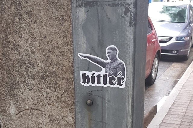 A sticker of Hitler giving a Nazi salute.