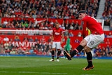 Manchester United striker Wayne Rooney scores from a free kick against Crystal Palace.