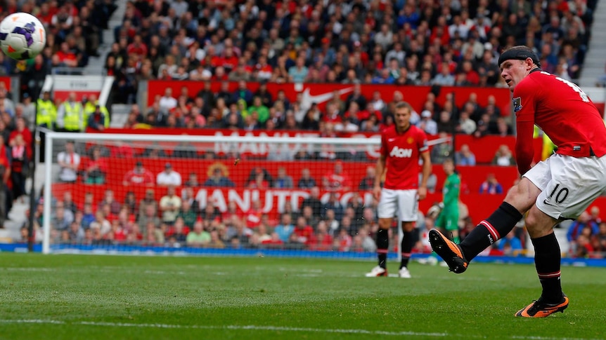 Manchester United striker Wayne Rooney scores from a free kick against Crystal Palace.