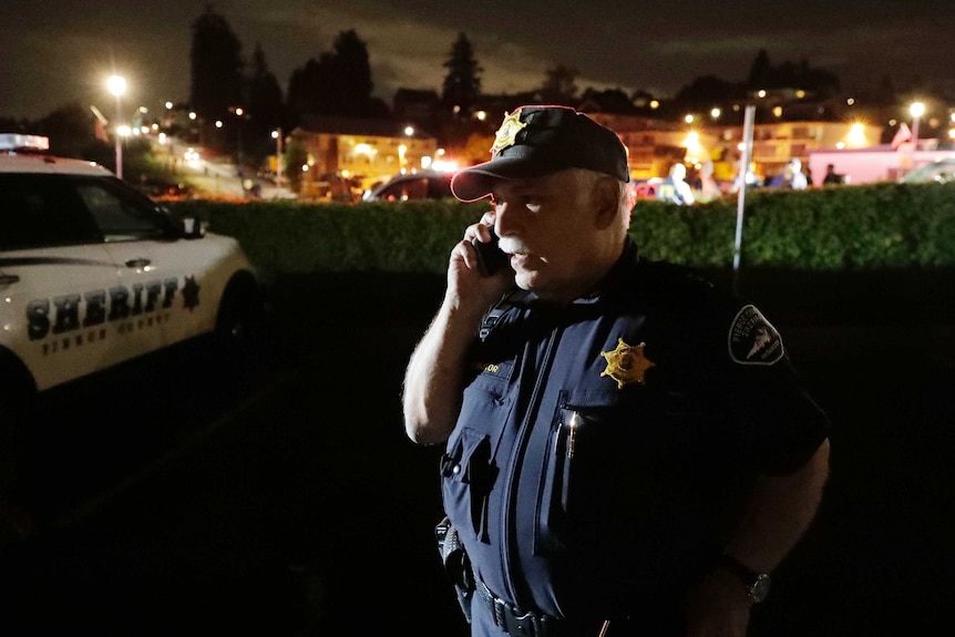 Sheriff talks on phone at staging area after plane stolen in Seattle