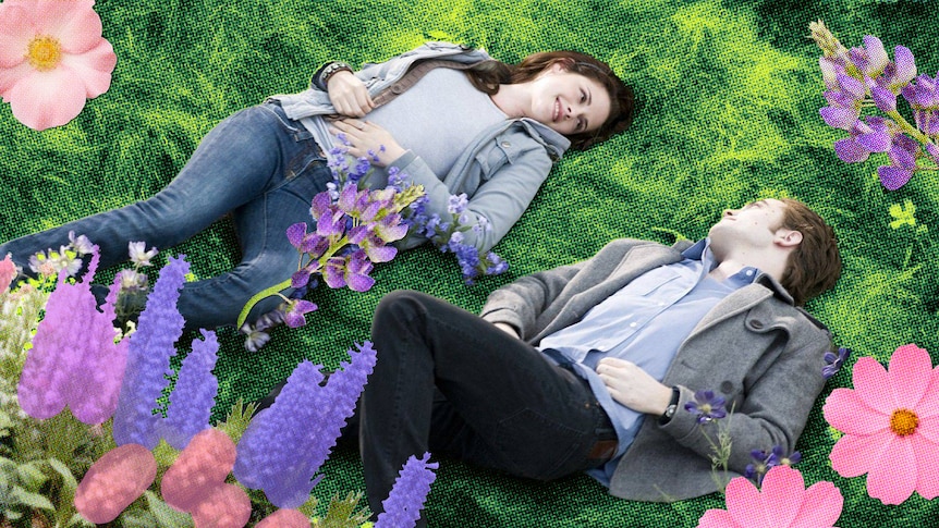 Kristen Stewart, left, looks at Robert Pattinson, right, as they lay on green grass, cut out collage-type flowers framing them.
