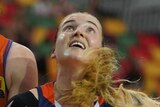 Nadeen Payne of the Townsville Fire and Anneli Maley of the Sydney Uni Flames contest a rebound in the WNBL.