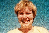 a 1980s photograph of a young woman with short hair against a blue sky