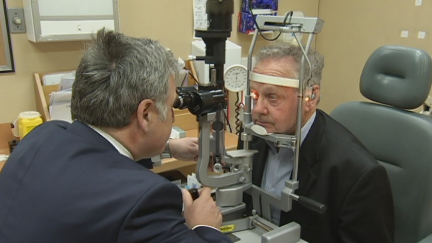 Ophthalmic surgeon Mark Daniel with patient Victor Fortemann