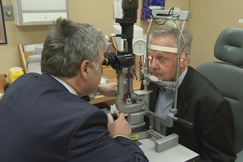 Ophthalmic surgeon Mark Daniel with patient Victor Fortemann