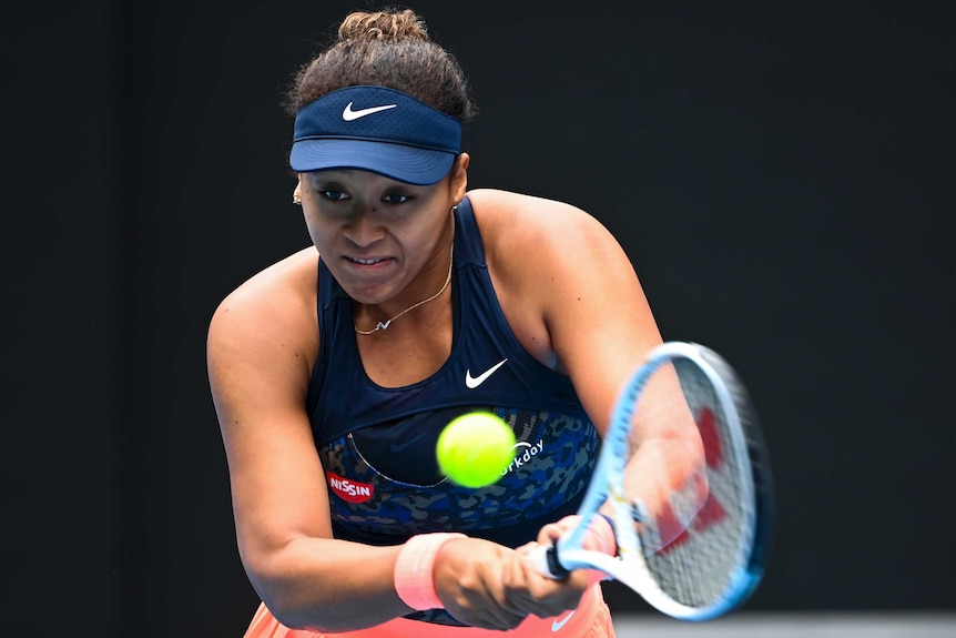 Naomi Osak plays a backhand return against Anastasia Pavlyuchenkova at the Australian Open in Melbourne.