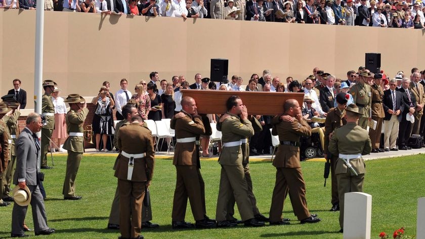 Prince Charles and Governor General Quentin Bryce follow the honour guard.