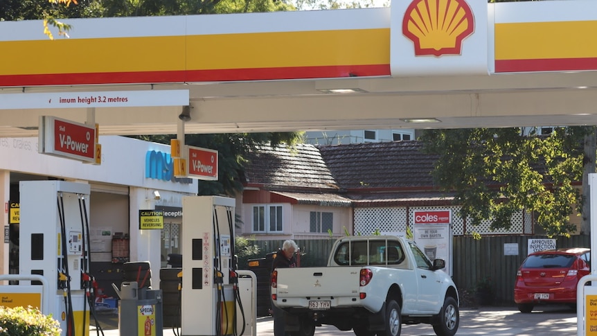 Vehicle at petrol bowser at Shell and Coles Xpress service station in Brisbane