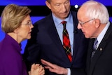 Democratic 2020 US presidential candidates (L-R) Senator Elizabeth Warren (D-MA) speaks with Senator Bernie Sanders.