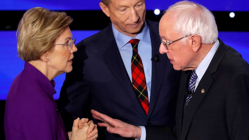 Democratic 2020 US presidential candidates (L-R) Senator Elizabeth Warren (D-MA) speaks with Senator Bernie Sanders.