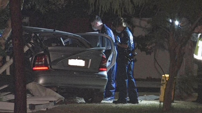 Forensics examine the car