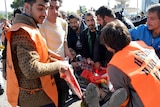 An injured person carried after Ankara bomb blast