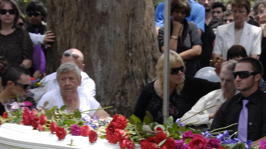 The caskets of Donna and Jordan Rice rest together