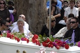 The caskets of Donna and Jordan Rice rest together