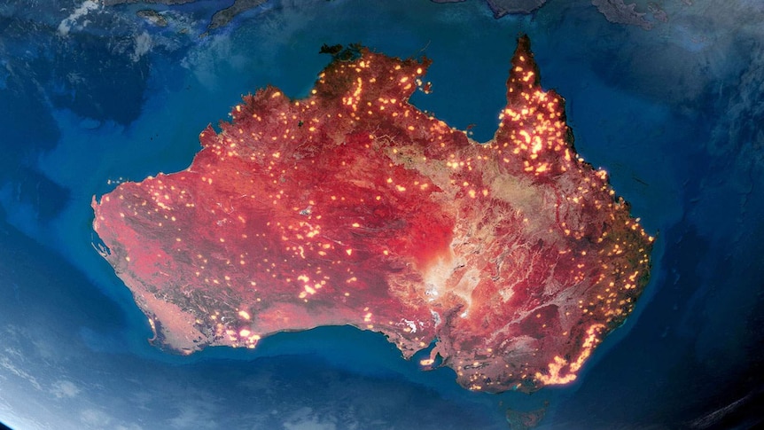 A satellite view of Australia with large patches of bright yellow lights around sections of the country