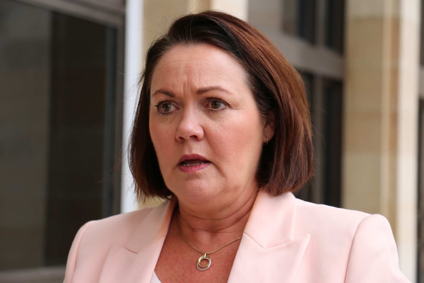 A headshot of Liza Harvey standing outside the WA Parliament