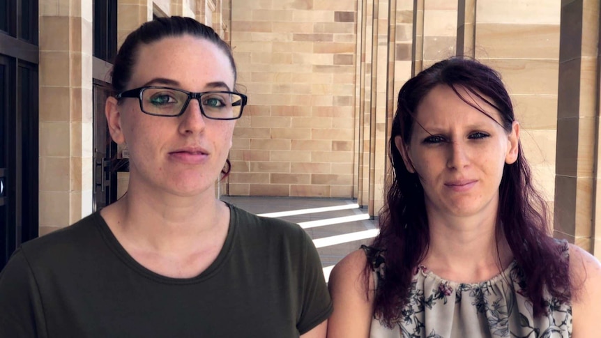 Skye Quartermaine and her sister Dee on the steps of Parliament House