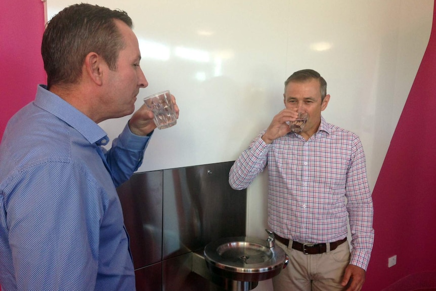Premier Mark McGowan and Health Minister Roger Cook sample the water at the Perth Children's Hospital.