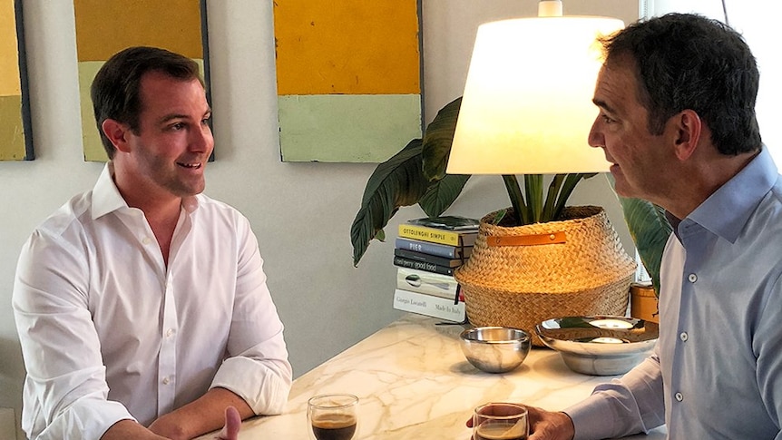 Two men meeting with coffee