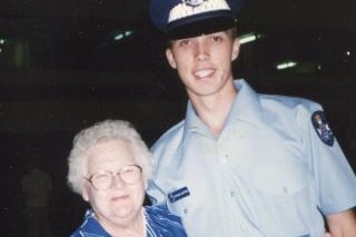 Photo of Peter Dutton as a police officer with his grandmother