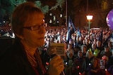 About 2,000 workers gathered outside State Parliament last night protesting against job cuts.