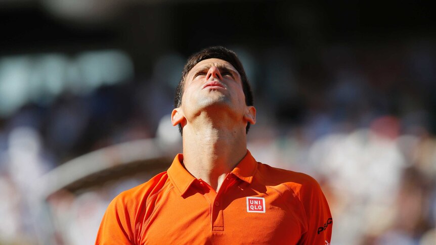 Novak Djokovic looks to the heavens