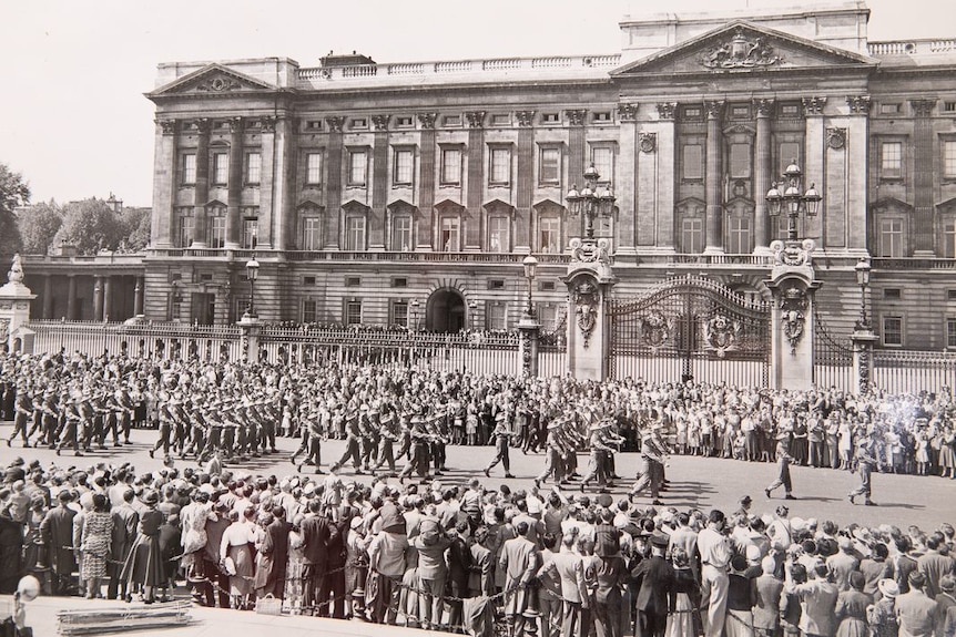 Australian soldiers march outside Buckingham Palace.
