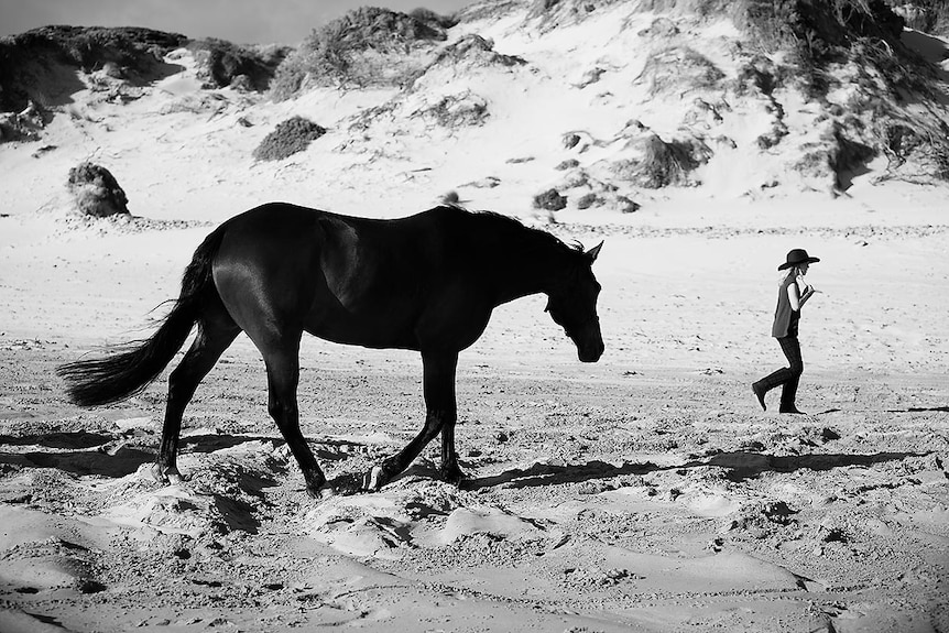 Jordy Summers and her horse, Jazz, on British Admiral beach