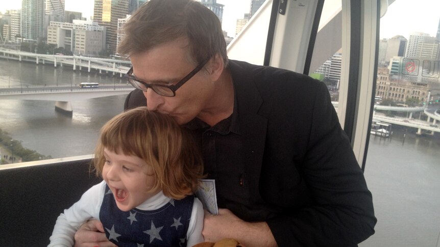 Photo Nigel with his daughter, aged 3, on a ferris wheel in Brisbane.