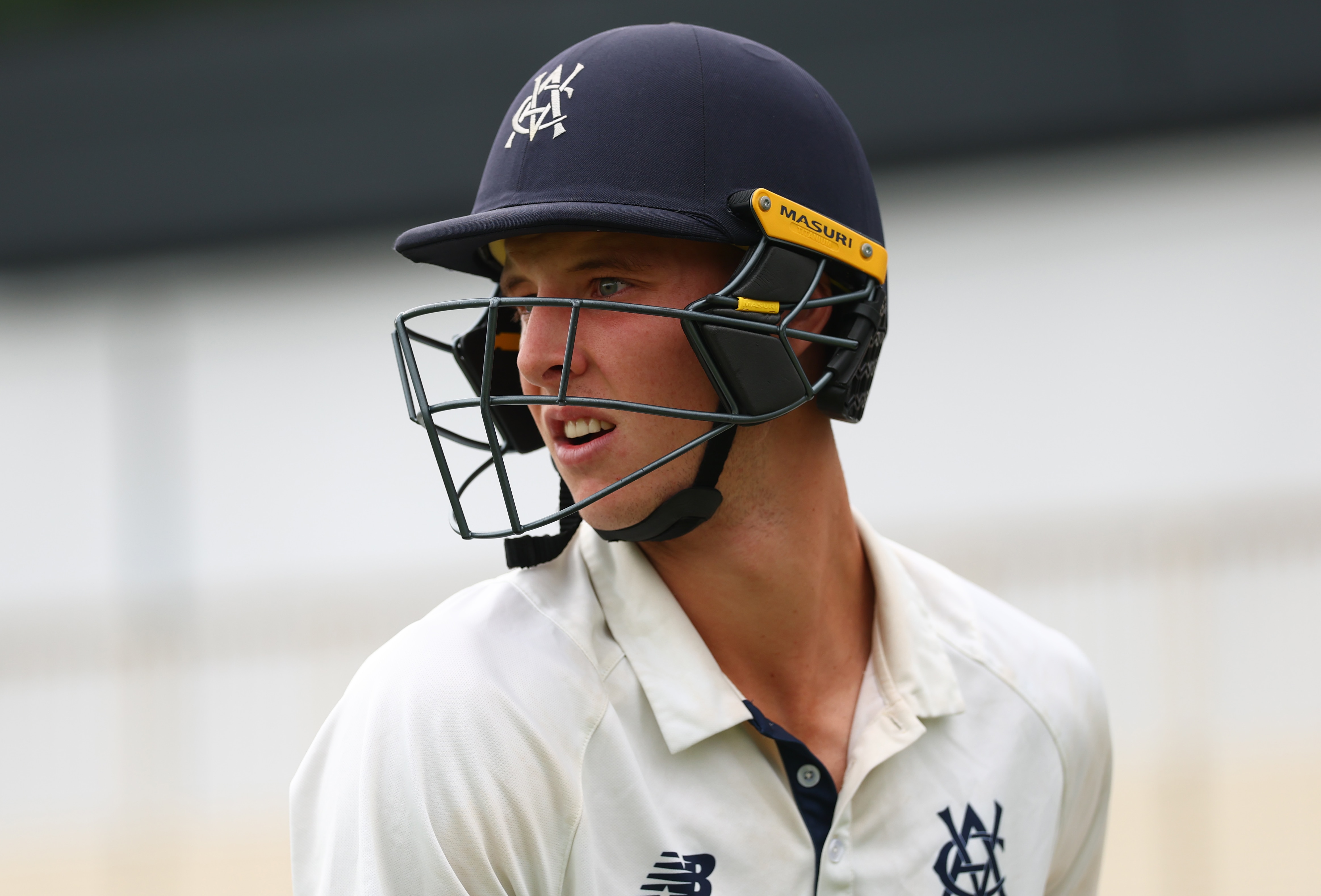 Campbell Kellaway looks out from under a batting helmet