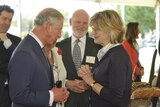 Former Prince of Wales chats with woman
