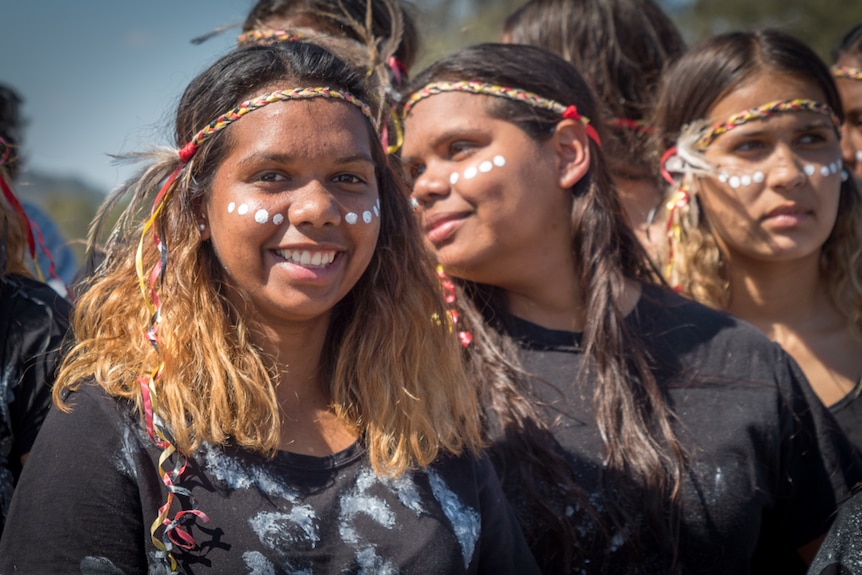 Aboriginal teens in face paint
