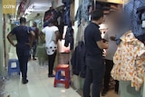 African men at a market in Guangzhou, China.