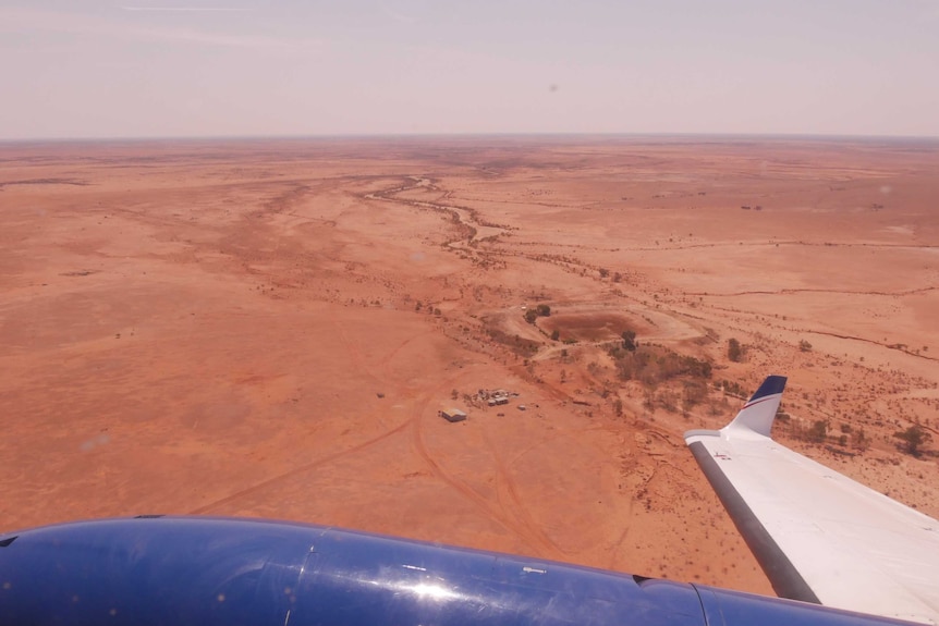 Aerial view of Veldt Station homestead in the Australian Outback taken from the cockpit of an RFDS plane