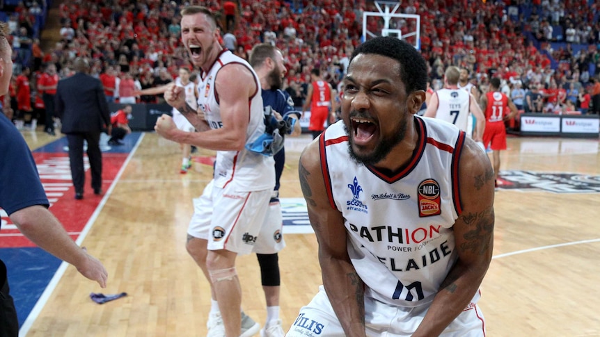 Ramone Moore of the 36ers celebrates winning the semi-final NBL game between the Perth Wildcats and the Adelaide 36ers.