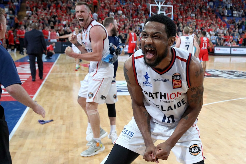 Ramone Moore of the 36ers celebrates winning the semi-final NBL game between the Perth Wildcats and the Adelaide 36ers.