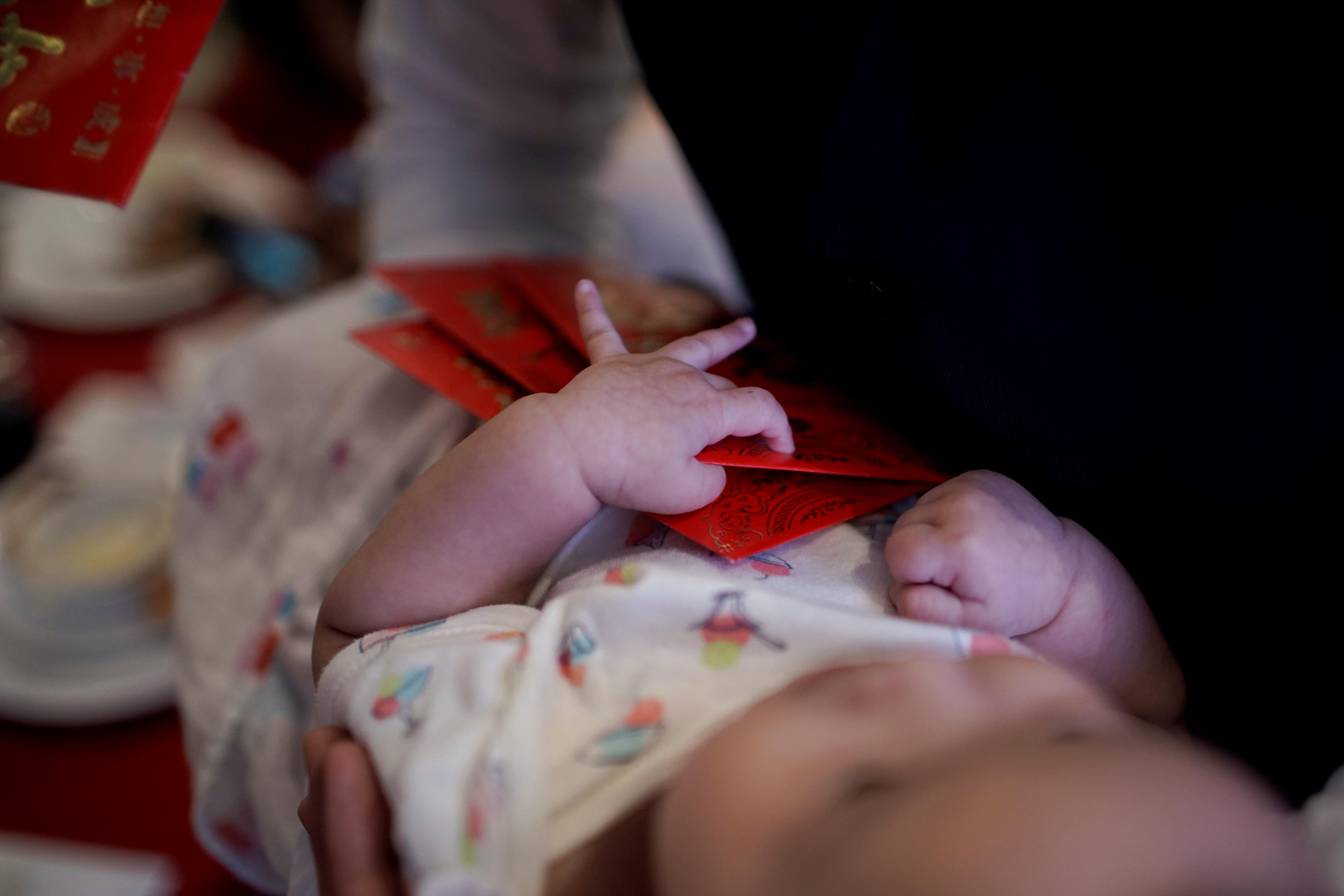 China's birth rate has hit a record low. Experts say it spells long-term trouble