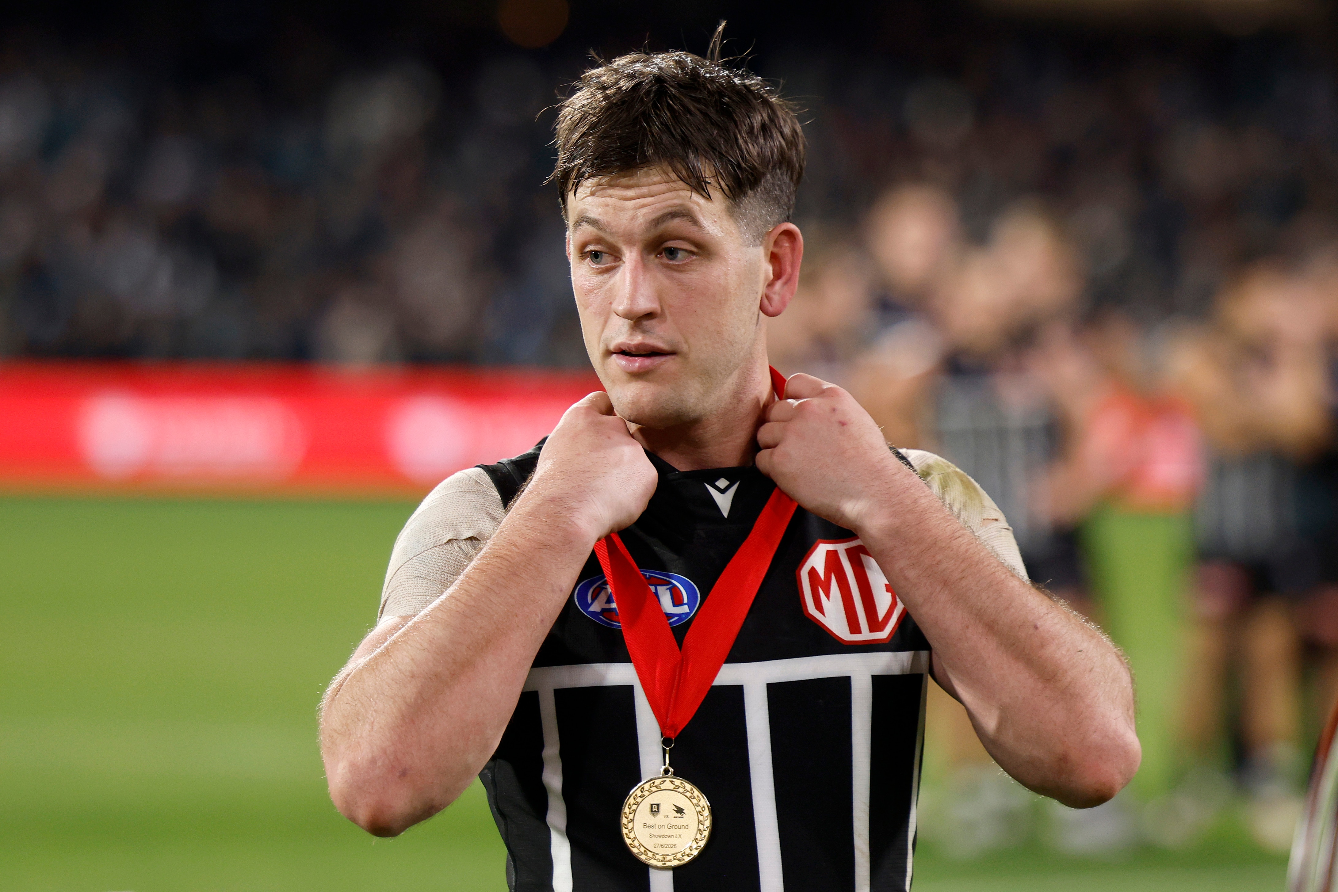 Zak Butters wearing the Showdown Medal.