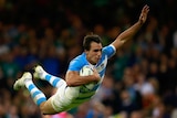 Juan Imhoff flies over for a try against Ireland