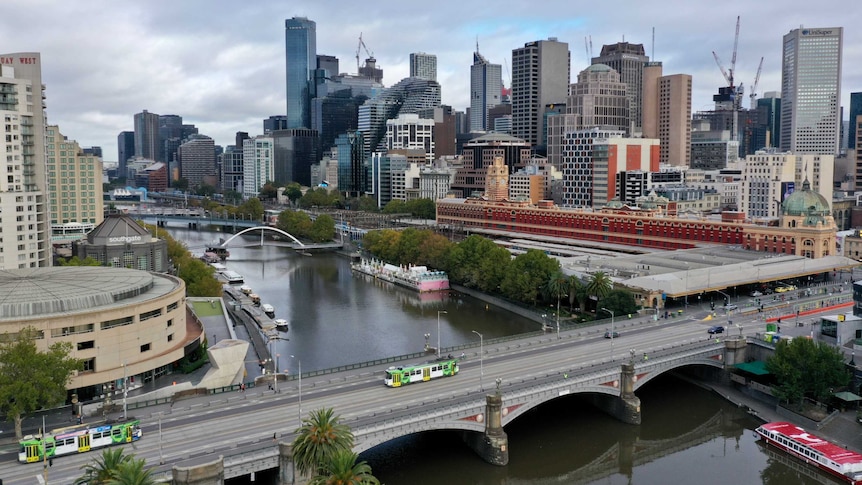 Princes Bridge near Flinders St Station in Melbourne's CBD with hardly any traffic on it.